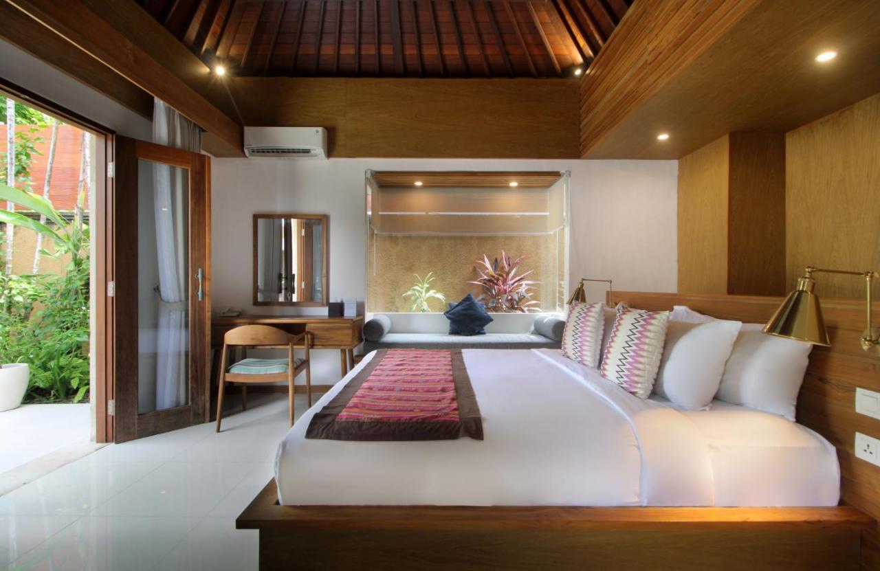 사가라 빌라 앤 스위트 발리 사누르 외부 사진 A bedroom at the resort