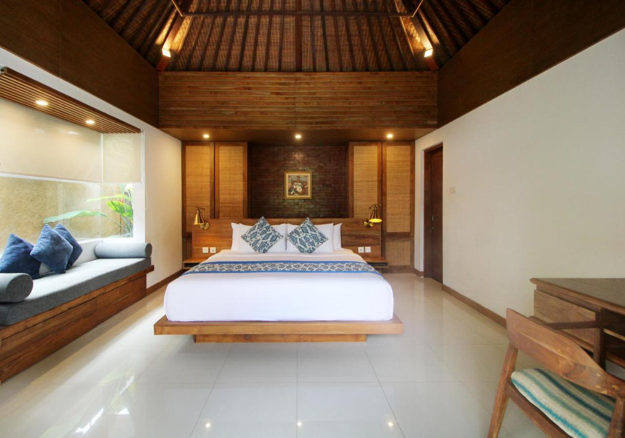 사가라 빌라 앤 스위트 발리 사누르 외부 사진 A bedroom in a villa